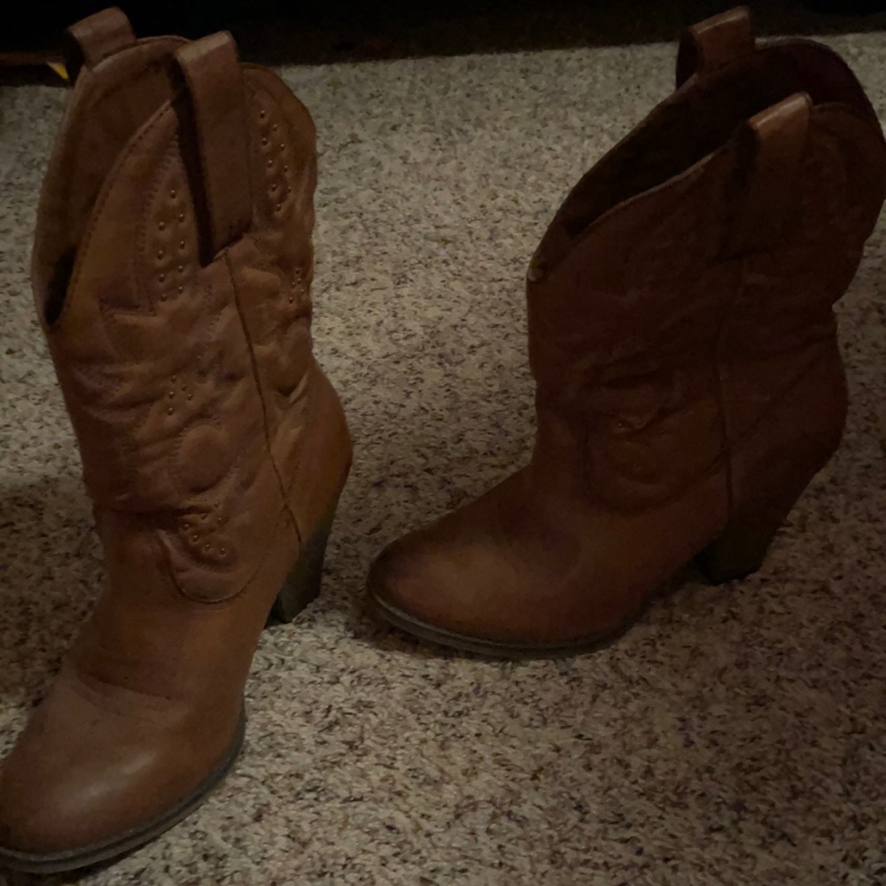 Heeled cowboy boots. Like new. Worn a few times. MIA brand